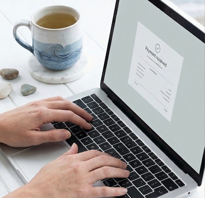Reviewing a website design quote on a laptop