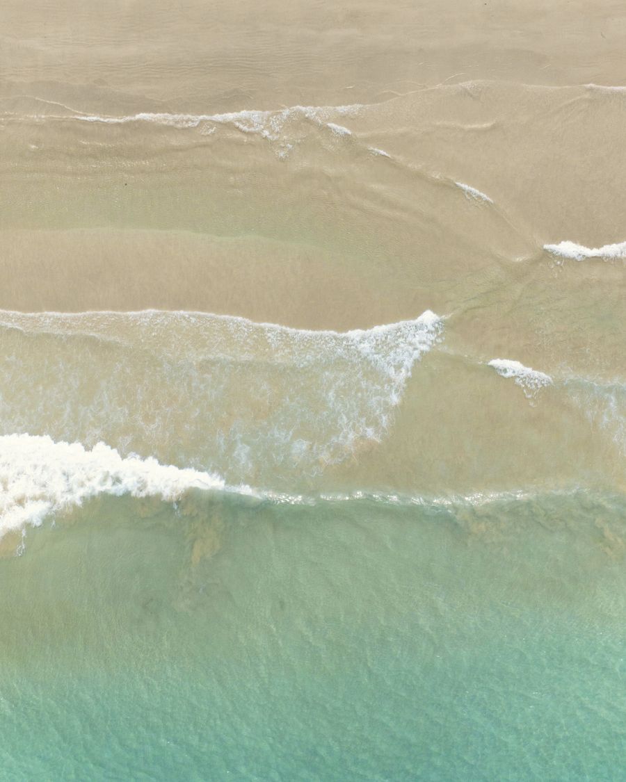 Aerial view of the saltline, where the ocean leaves its mark on the sand