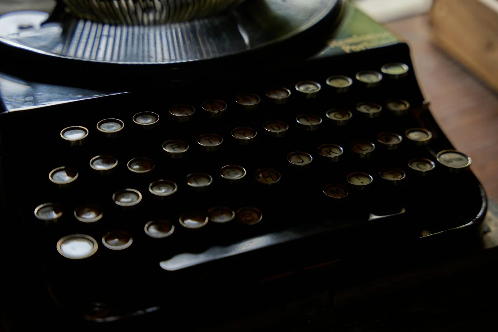 Old typewriter sitting on a table