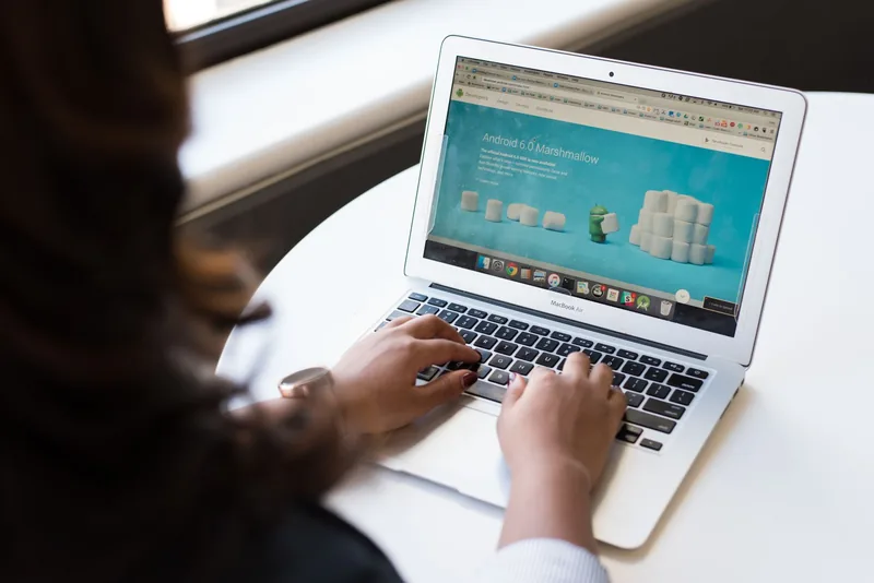 Browsing a clean small business website on a laptop